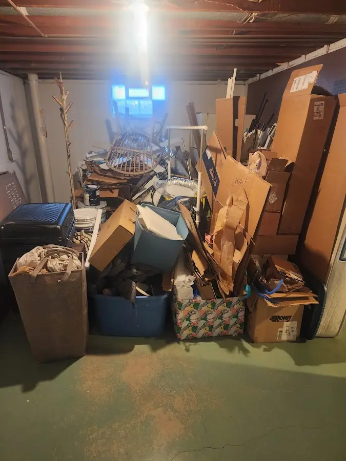 Roll-off dumpster container at job site for 2 Yard Dumpster Rental in Goodland